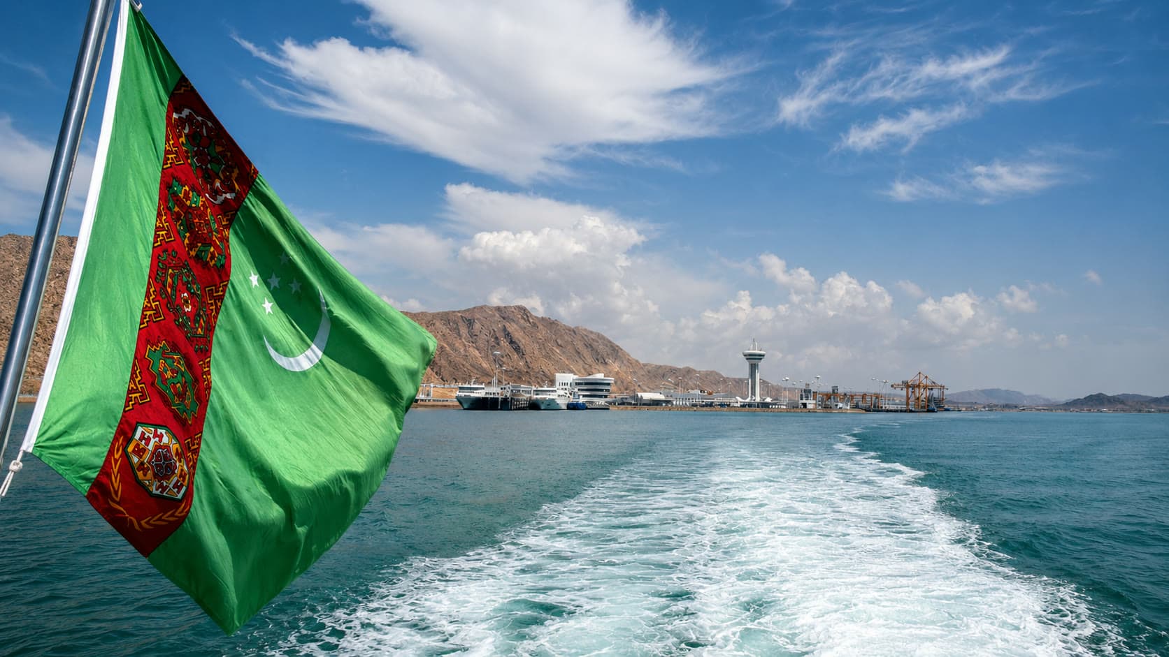 Turkmen flag over the Caspian, leaving the port of Turkmenbashi